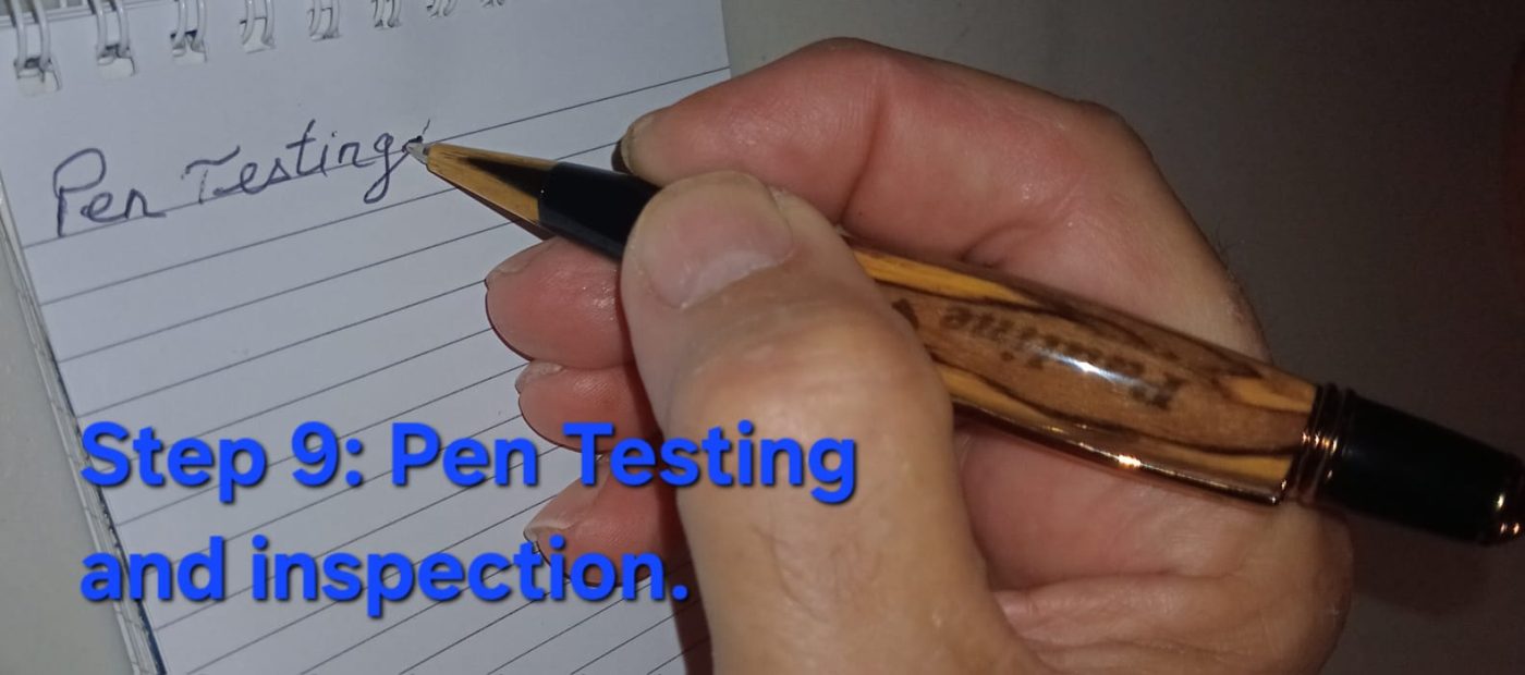 Test & inspect — finished engraved pen held in hand for final inspection